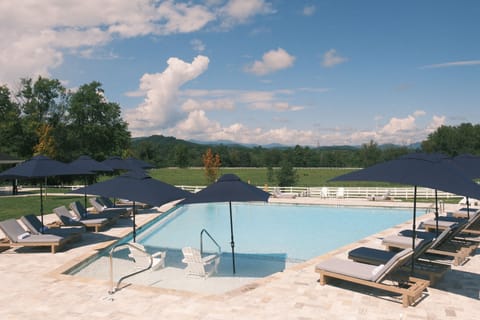 Outdoor pool, open 7:00 AM to 9:00 PM, pool umbrellas, sun loungers