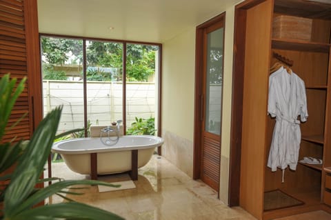 Rooftop Villa, 2 Bedrooms, Garden View | Bathroom | Separate tub and shower, deep soaking tub, free toiletries, hair dryer