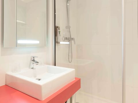 Shower, eco-friendly toiletries, hair dryer, towels