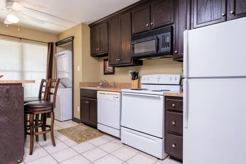 Studio, Multiple Beds, Balcony (GULFVIEW II 105) | Private kitchen | Fridge, microwave, oven, stovetop