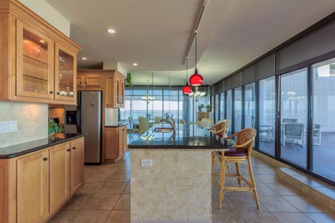 Condo, Multiple Beds, Balcony, Ocean View (SUNCHASE IV 1102) | Private kitchen | Full-size fridge, microwave, oven, stovetop