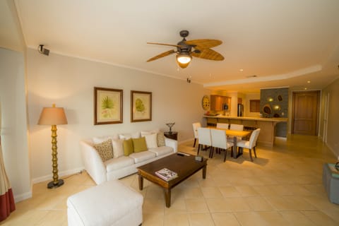 Deluxe Condo, 2 Bathrooms, Garden View | Living room | Flat-screen TV