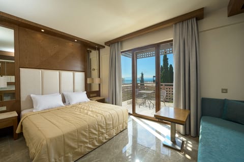 Double Room, Partial Sea View | Premium bedding, down comforters, minibar, in-room safe