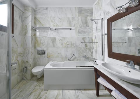 Suite | Bathroom | Shower, rainfall showerhead, hair dryer, slippers