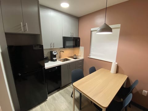 Junior Suite  (Newly Renovated Unit/Building) | Private kitchen | Microwave, highchair