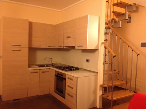 Apartment, 2 Bedrooms | Private kitchenette | Full-size fridge, microwave, stovetop, coffee/tea maker