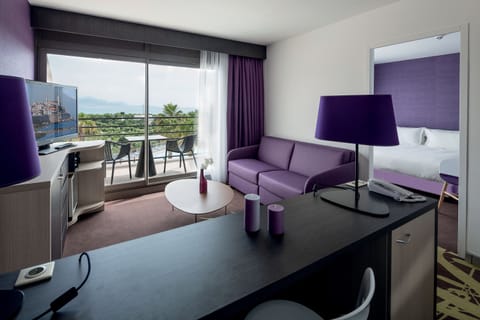 Suite, Sea View | Living area | Flat-screen TV