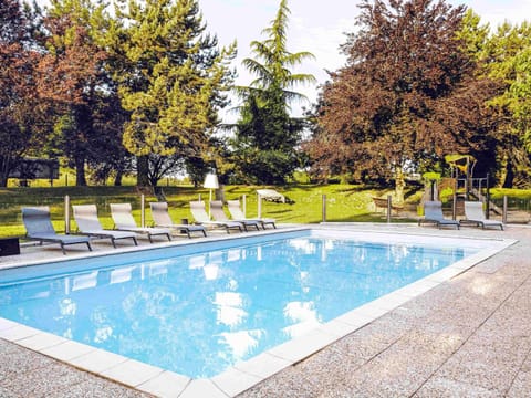 Seasonal outdoor pool, open 9:00 AM to 9:00 PM, sun loungers