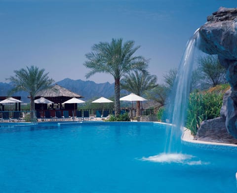 2 outdoor pools, open 8:00 AM to 8:00 PM, pool umbrellas, sun loungers