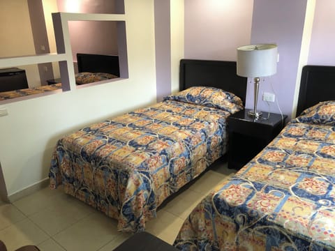 Standard Triple Room, 3 Twin Beds | Iron/ironing board, free WiFi, bed sheets