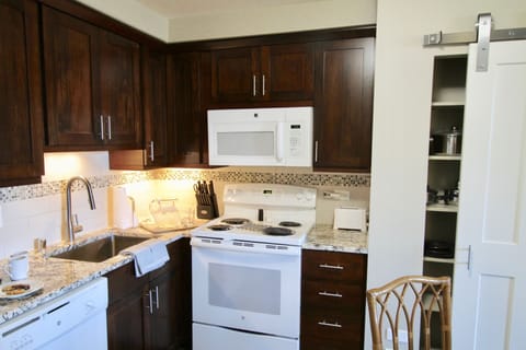 One Bedroom Interior | Private kitchen | Fridge, microwave, oven, stovetop