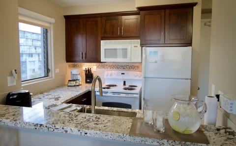 One Bedroom Corner | Private kitchen | Fridge, microwave, oven, stovetop