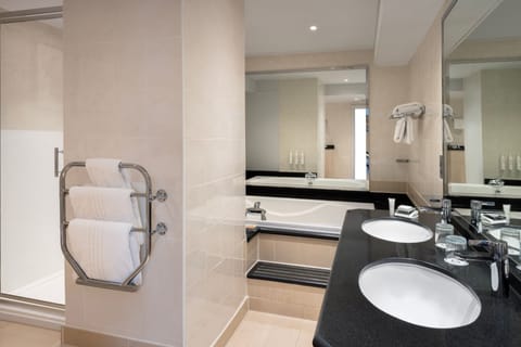 Suite, 1 Bedroom, Non Smoking | Bathroom | Combined shower/tub, designer toiletries, hair dryer, towels