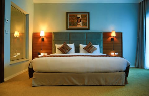 Business Suite | Egyptian cotton sheets, down comforters, pillowtop beds, minibar