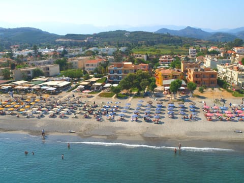 On the beach, sun loungers, beach umbrellas, 2 beach bars