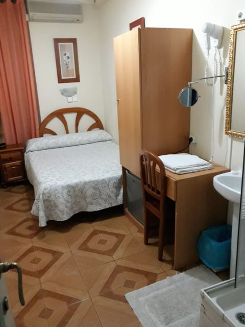 Basic Double Room, Shared Bathroom | In-room safe, free WiFi