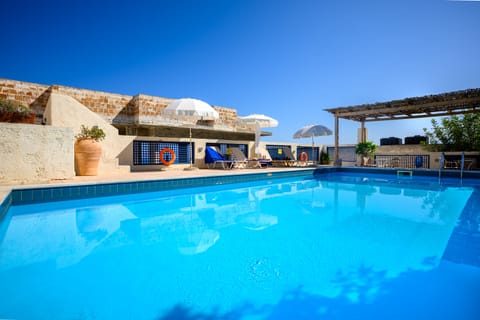 Outdoor pool, open 8:30 AM to 6:30 PM, pool umbrellas, sun loungers