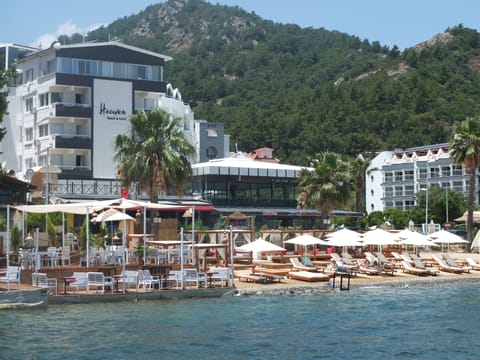 Private beach, white sand, sun loungers, beach umbrellas