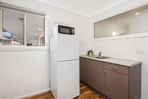 2 Bedroom Apartment | Private kitchenette | Fridge, microwave, electric kettle, toaster