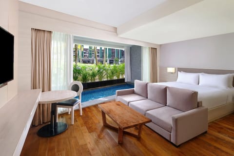 Deluxe Suite, 1 Bedroom, Pool View | 1 bedroom, premium bedding, free minibar items, in-room safe