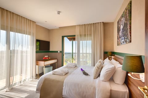 Signature Suite, 2 Bedrooms | Premium bedding, minibar, in-room safe, desk