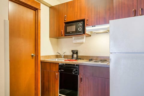 Premium bedding, desk, blackout drapes, iron/ironing board