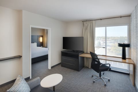 Suite, 1 Bedroom, Non Smoking | Living room | 55-inch flat-screen TV with cable channels, TV, Netflix