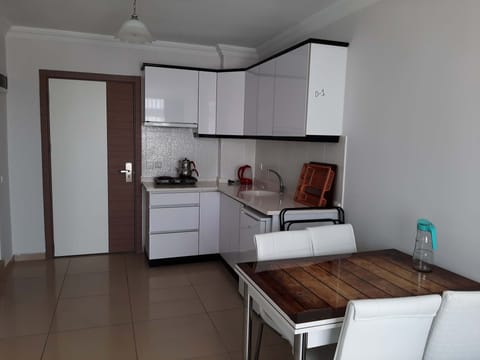 Apartment, 1 Bedroom, Sea View | Private kitchen | Mini-fridge, stovetop