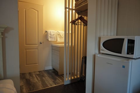 Standard Room, Multiple Beds, Non Smoking | In-room safe, desk, iron/ironing board, free cribs/infant beds