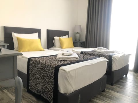 Standard Room, 2 Twin Beds, Garden View | In-room safe, blackout drapes, free WiFi, bed sheets