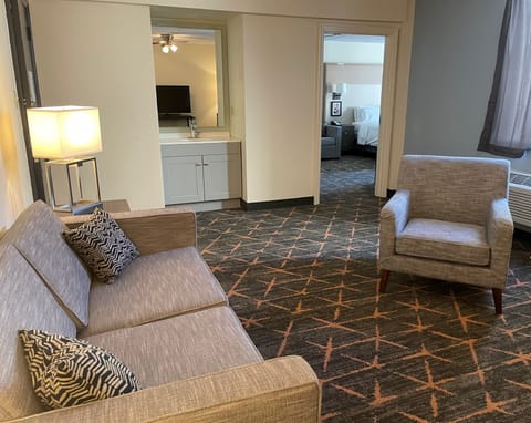 Suite, 1 Bedroom | In-room safe, desk, blackout drapes, iron/ironing board