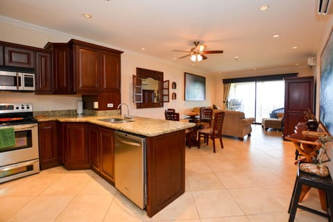 Condo, 2 Bedrooms | Private kitchen | Full-size fridge, microwave, stovetop, dishwasher