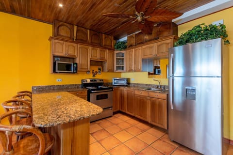 Condo, 2 Bedrooms | Private kitchen | Full-size fridge, microwave, stovetop, coffee/tea maker