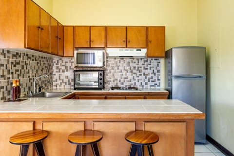 Condo, 1 Bedroom, Ocean View | Private kitchen | Full-size fridge, microwave, stovetop, coffee/tea maker