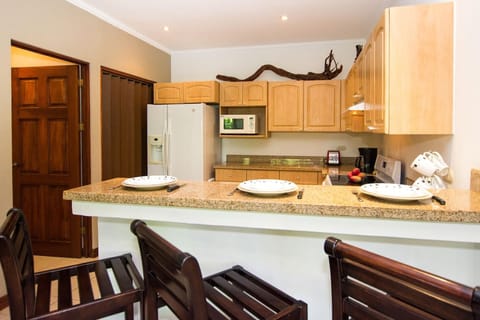 Condo, 2 Bedrooms, Ocean View | Private kitchen | Full-size fridge, microwave, stovetop, dishwasher