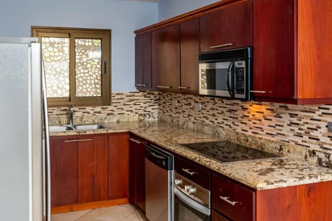 Condo, 2 Bedrooms, Ocean View | Private kitchen | Full-size fridge, microwave, stovetop, dishwasher