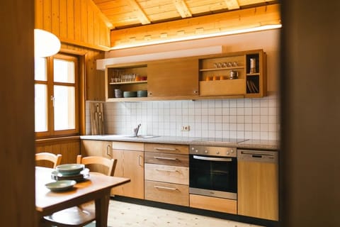 Apartment (Tannberg) | Private kitchen | Fridge, microwave, oven, stovetop