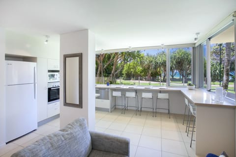 Deluxe Apartment, 3 Bedrooms, Beach View, Beachfront | Private kitchen | Full-size fridge, microwave, stovetop, dishwasher