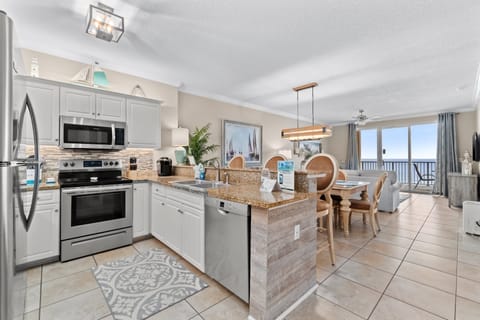 Condo, 2 Bedrooms, Balcony, Ocean View (404) | Private kitchen | Full-size fridge, microwave, coffee/tea maker, toaster