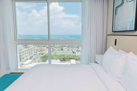 Suite, Non Smoking, Ocean View (2 King & 2 Single Beds) | Premium bedding, memory foam beds, in-room safe, iron/ironing board