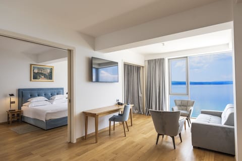 Deluxe Suite, Sea View | Hypo-allergenic bedding, minibar, in-room safe, desk