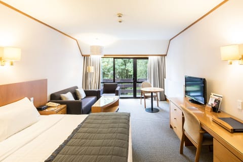 Premium Suite, 1 King Bed, Garden View | Premium bedding, minibar, in-room safe, desk