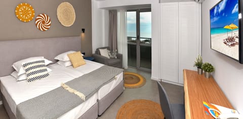 Double or Twin Room, Balcony, Sea View | Desk, bed sheets