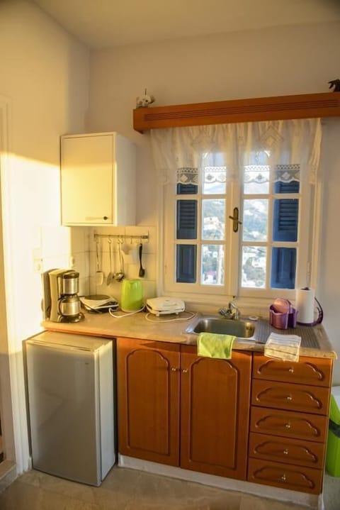 Honeymoon Room, Sea View (Top Floor) | Private kitchenette | Fridge, stovetop, coffee/tea maker, electric kettle