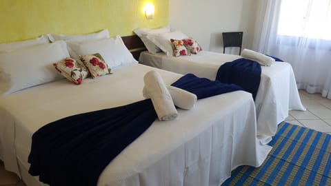 Standard Triple Room, Sea View | In-room safe, desk, free cribs/infant beds, free WiFi