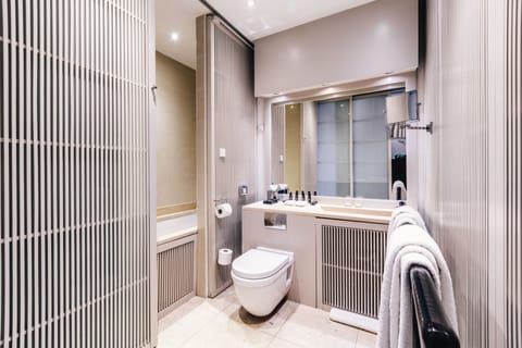 Double Room | Bathroom | Designer toiletries, hair dryer, bathrobes, slippers