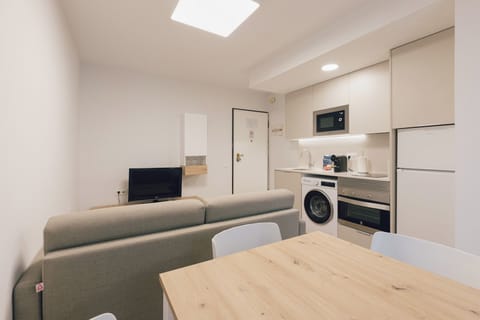 32-inch flat-screen TV with digital channels, TV