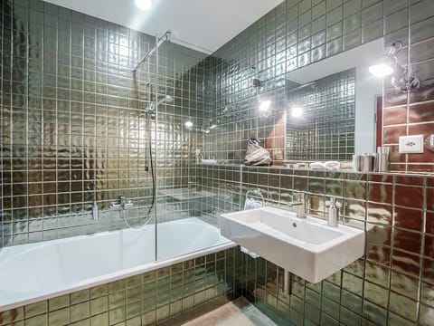Superior Double Room, Courtyard View | Bathroom | Shower, hair dryer, towels, soap