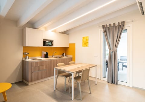 Double or Twin Room, Balcony | Private kitchen | Fridge, stovetop, electric kettle, highchair