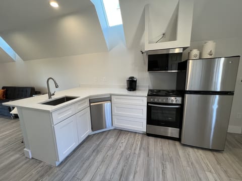 Premium Cabin, Non Smoking | Private kitchen | Full-size fridge, microwave, coffee/tea maker, highchair